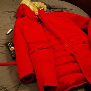 A new orangish red Women's long L winter jacket. Ralph Lauren